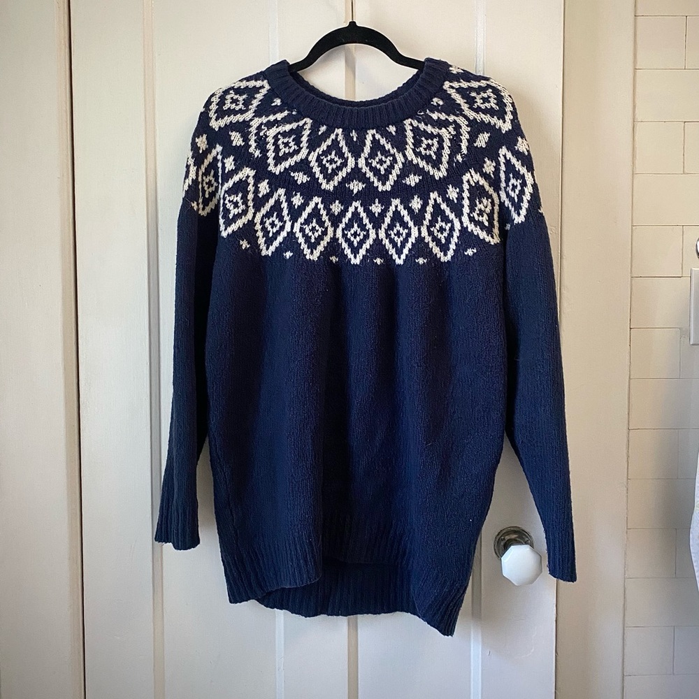blue fisherman-style sweater with white detailing